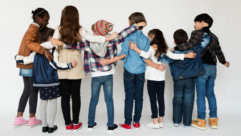 students holding hands